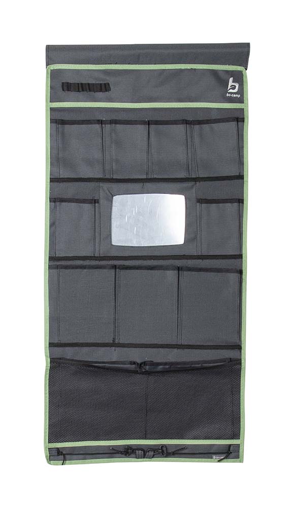 1771505 A multi-functional 12 compartment organizer with mirror. Made from a high quality Two-Tone 600D Oxford Polyester. Has 2 large compartments including a net, 3 medium compartments six small compartments and a mirror. Simple, and can be mounted in various ways. This pelmet can be hung on a caravan rail with the string, with velcro to the tent pole or with eyelets on hooks. The loops at the bottom provide additional fixation.
